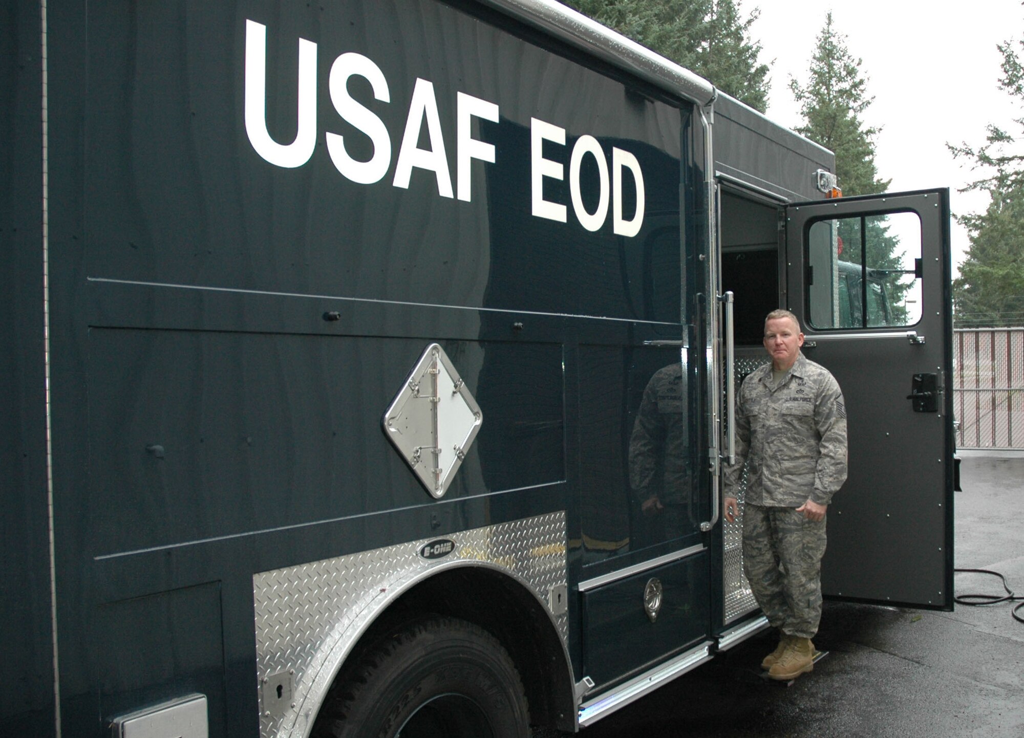 JOINT BASE LEWIS-MCCHORD, Wash. - Master Sgt. Glen Tuttle, 446th Civil Engineer Squadron Explosive Ordnance Flight, demostrates the latest EOD specialty truck.  Sergeant Tuttle was recently awarded the Air Mobility Command Outstanding Civil Engineer Air Reserve Component NCO manager of the year. (U.S. Air Force Photo/Staff Sgt. Javier Cruz)