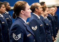 Staff Sgt. Margaret Henley, 919th Medical Squadron, waits for her turn to be inducted during the 919th Special Operations Wing NCO induction ceremony Nov. 6 at Duke Field.  The ceremony also inducted new master sergeants within the wing.  46 staff sergeants and 30 master sergeants were inducted. (Air Force photo/Tech Sgt. Samuel King Jr.)