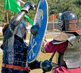 Medieval knights duel during a demonstration at the 919th Special Operations Wing “family day” event at Duke Field, Nov. 6.   The Family Day event brought reservists and their families together for food, games and music. (Air Force photo/Tech. Sgt. Samuel King Jr.)