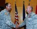 Lt. Col. Nathan Nelson, 151st Civil Engineering Squadron, Utah Air National Guard, receives a Bronze Star medal from Maj. Gen. Brian Tarbet, the Utah National Guard Adjutant General, at a ceremony on November 7. Colonel Nelson received the award for his distinguished service as the Facility Engineering Team Officer-in-Charge in Iraq from November 2009 through May 2010.(U.S. Air Force photo by Tech. Sgt.  Kelly Collett)(RELEASED)
