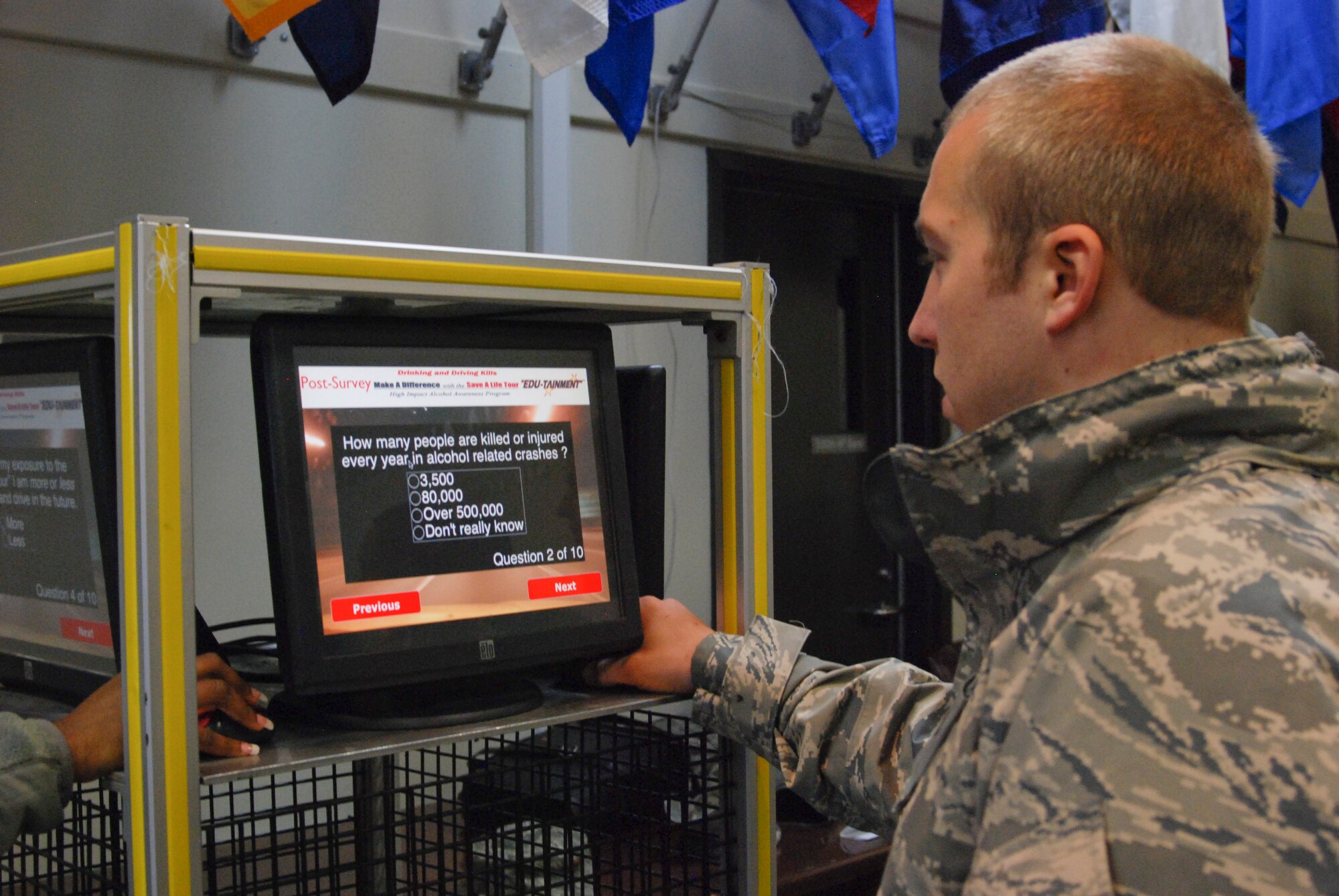 Senior Airman Allen Williams, 80th Aerial Port Squadron aerial porter, completes the Save a Life Tour survey after the Nov. 7 presentation at Dobbins Air Reserve Base.  The tour is described as a high impact drug awareness program that utilizes real-life video which includes the results of actual drinking and driving accidents, police responses, emergency room scenes, and uncensored family responses.  (U.S. Air Force photo/Master Sgt. Stan Coleman) 