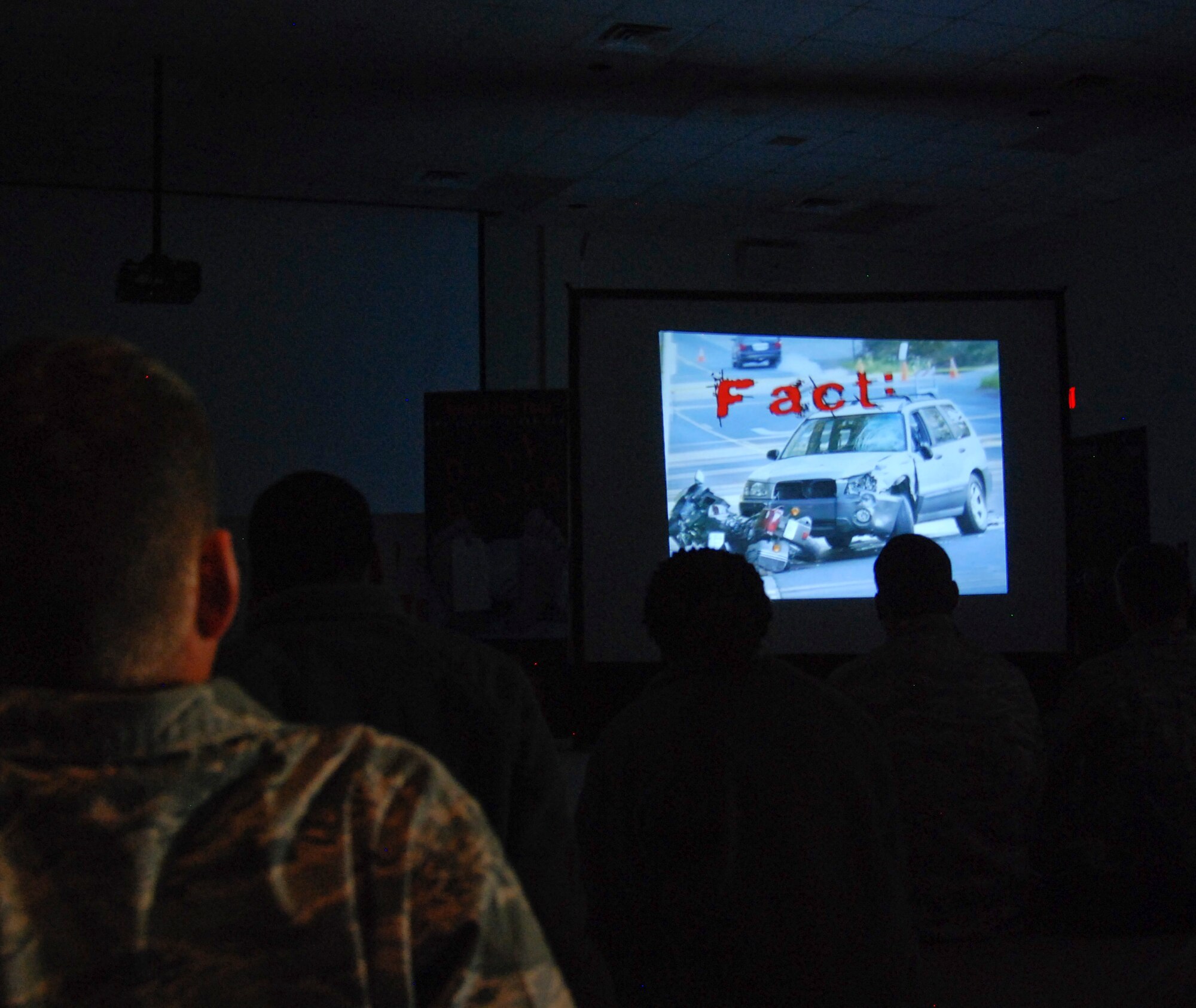 94th Airlift Wing Airmen and family members view the Save a Life Tour’s real video footage on the after effects of drinking and driving.  The tour is described as a high impact drug awareness program that utilizes real-life video which includes the results of actual drinking and driving accidents, police responses, emergency room scenes, and uncensored family responses.  (U.S. Air Force photo/Master Sgt. Stan Coleman)