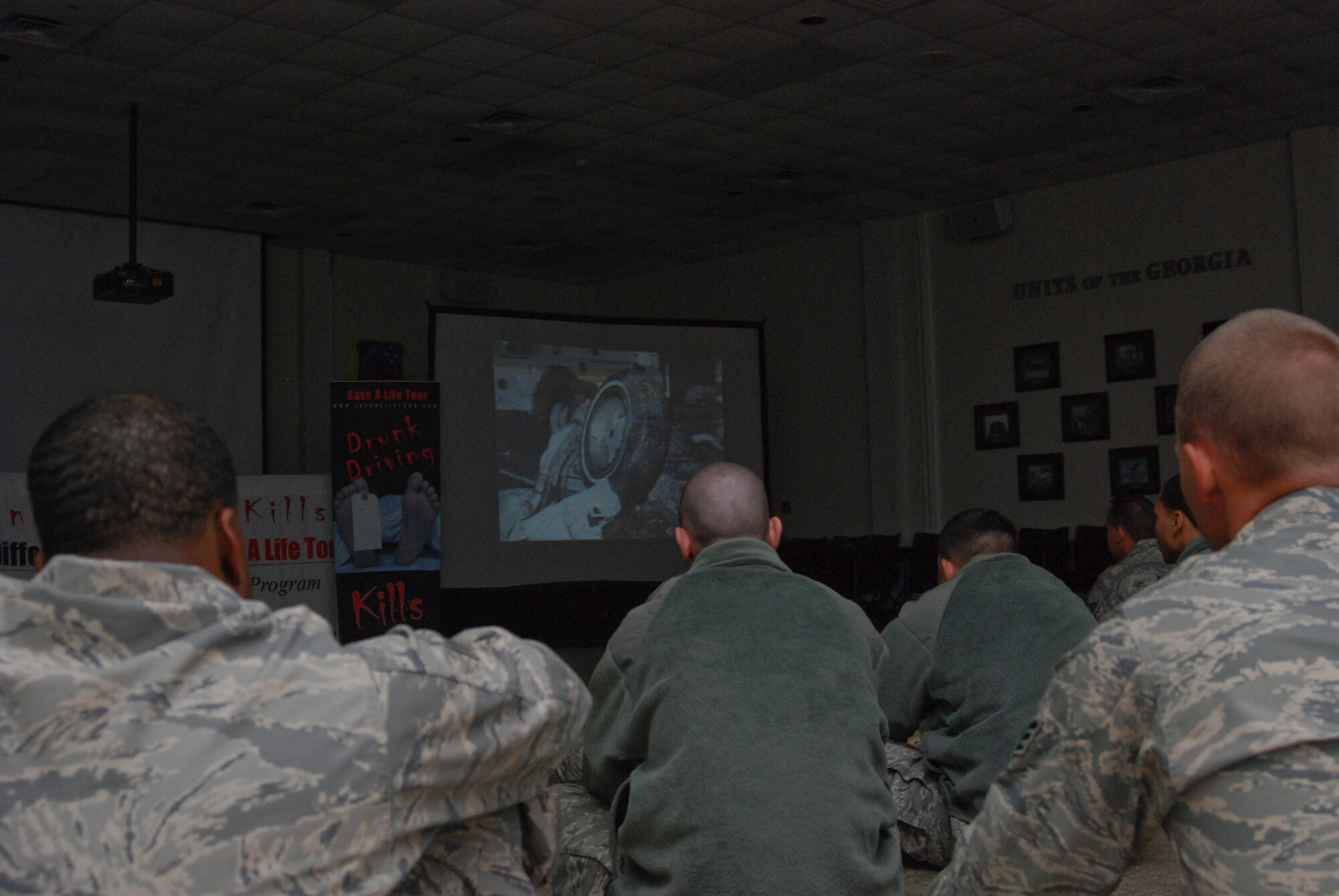 Footage is shown in the Save a Life Tour program presentation.  The tour will visit   19 bases as a program to educate Airmen on the effects of drinking and driving.  The Save a Life Tour was contracted by the Air Force Safety Center.  (U.S. Air Force photo/Master Sgt. Stan Coleman) 