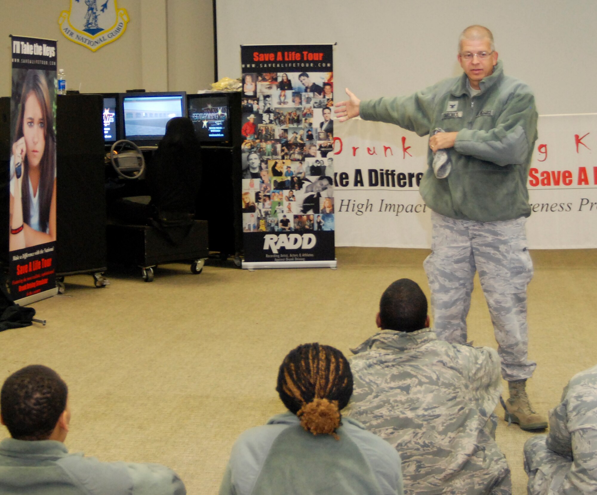 94th Airlift Wing commander, Col. Timothy Tarchick, talks to Airmen on the importance of not drinking and driving before the Save a Life Tour presentation. (U.S. Air Force photo/Master Sgt. Stan Coleman)