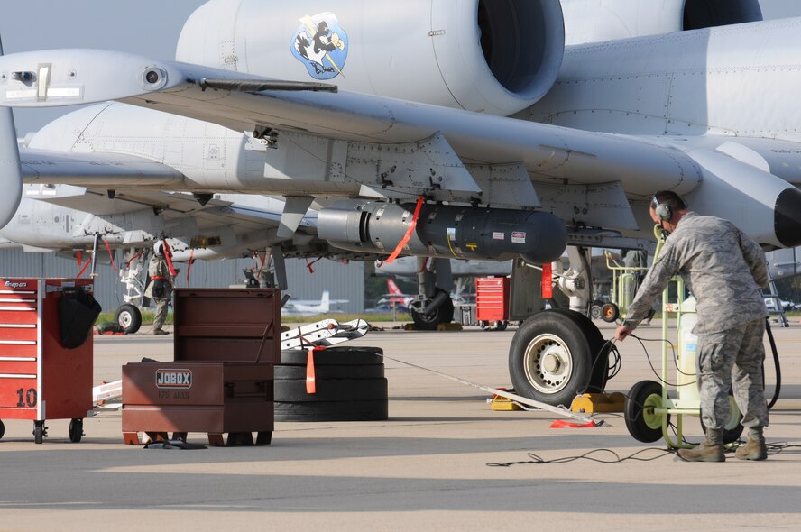 Maintenance personnel of the Maryland Air National Guard's 175th Aircraft Maintenance Squadron prepare to launch A-10C aircraft equipped with LITENING sensor pods at Warfield Air National Guard Base, Baltimore, Md., Nov. 6, 2010. The pods use the ROVER enhancement to beam imagery to the ground in real time. (U.S. Army photo by Sgt. Jennifer Sardam/Released)