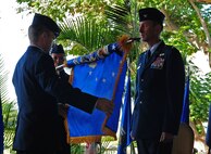 Lt. Gen. Hawk Carlisle (left), 13th Air Force commander and Col. Seth Bretscher, the 613th Support Group commander, encase the 613 SPTG unit flag a final time before the unit inactivated during a ceremony at Joint Base Pearl Harbor-Hickam, Hawaii, on Nov. 8, 2010.  The 613th SPTG became operational Dec. 16, 2005, and was comprised of the 17th Operational Weather Squadron and the 56th Air and Space Communications Squadron. The unit provided operational and personnel support to the 13th AF mission to plan, command and control, execute, and assess air, space, and information operations in the United States Pacific Command’s Area of Operations. (Air Force photo/ Master Sgt. Victoria Meyer) 
