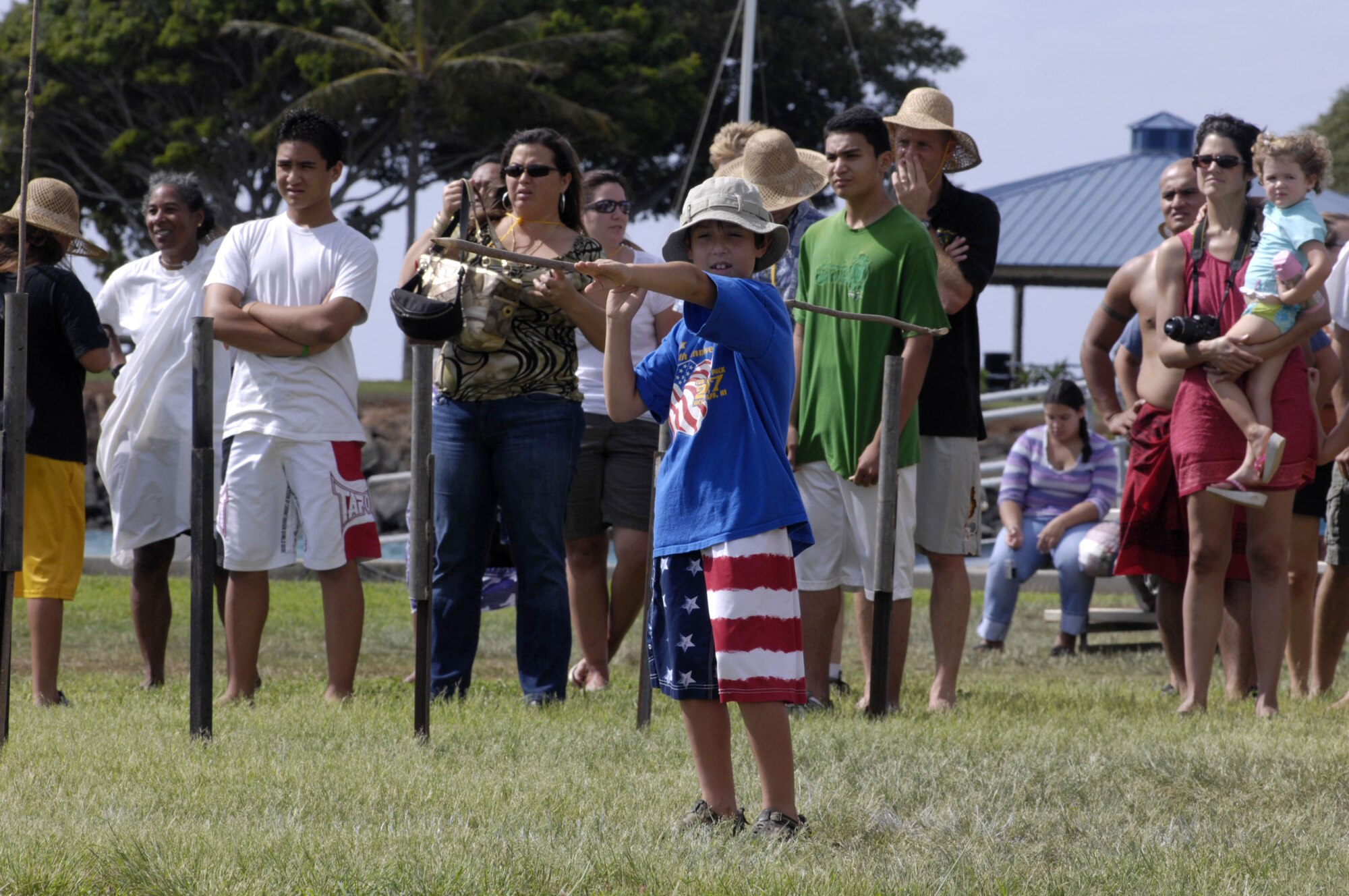 Dylan Thresher, son of Master Sergeant Marco Thresher, 13th Air Force, competes in the makaihe (spear throwing) event during the Makahiki ceremony at Hickam Harbor 6 Nov. 6 at Joint Base Pearl Harbor-Hickam, Hawaii.  (Photo by David D. Underwood, Jr.)