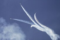 The Air Force Thunderbirds perform the bomb-burst maneuver during AirFest 2010 Nov. 6. The Thunderbirds headlined the two-day show that drew more than 574,000 people to Lackland. (U.S. Air Force photo/Robbin Cresswell) 
