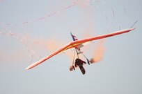 Dan Buchanan performs his hang gliding act during the during AirFest 2010 at Lackland Nov. 6. Mr. Buchanan was paralyzed in 1981 after a bad landing in a storm. (U.S. Air Force photo/Robbin Cresswell) 