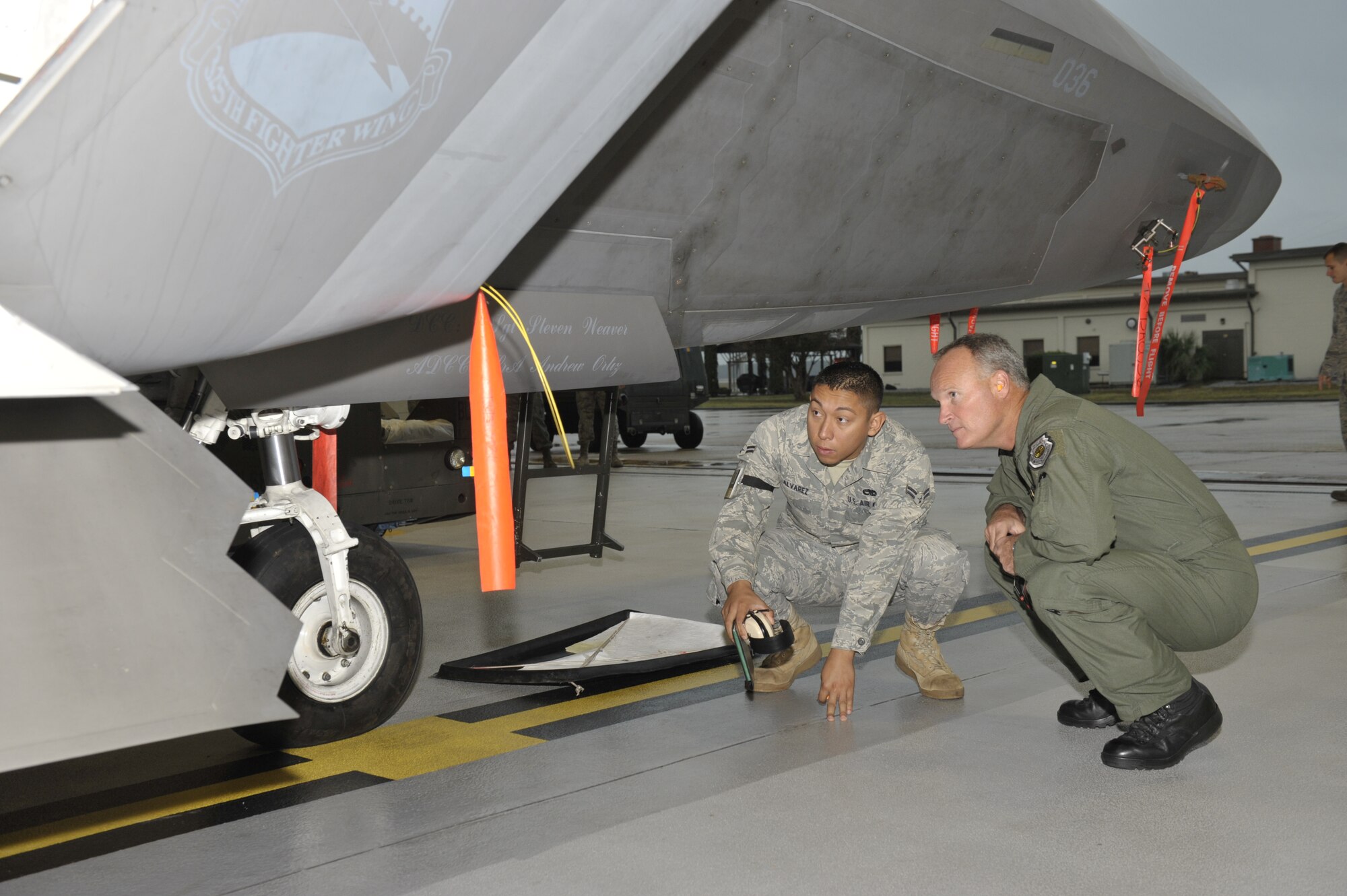 Brigadier Gen. James Browne, 325th Fighter Wing commander, shadowed Airman 1st Class Danyel Alvarez, 325th Maintenance Group lead crew member, while he conducted his daily duties Nov. 4.   
