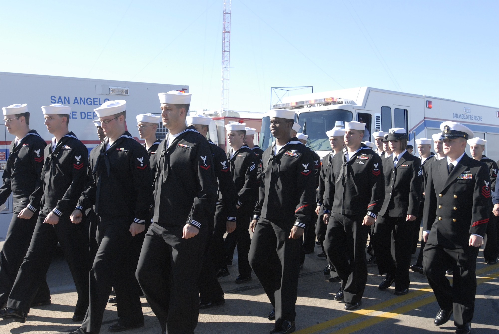 GOODFELLOW AIR FORCE BASE, Texas - Sailors from the Navy Center for Information Dominance Detachment, march during the San Angelo Veterans Parade held Nov. 6., to honor veterans for their service and sacrifice to the country. (U.S. Air Force photo /Airman 1st Class Anne Gathua)