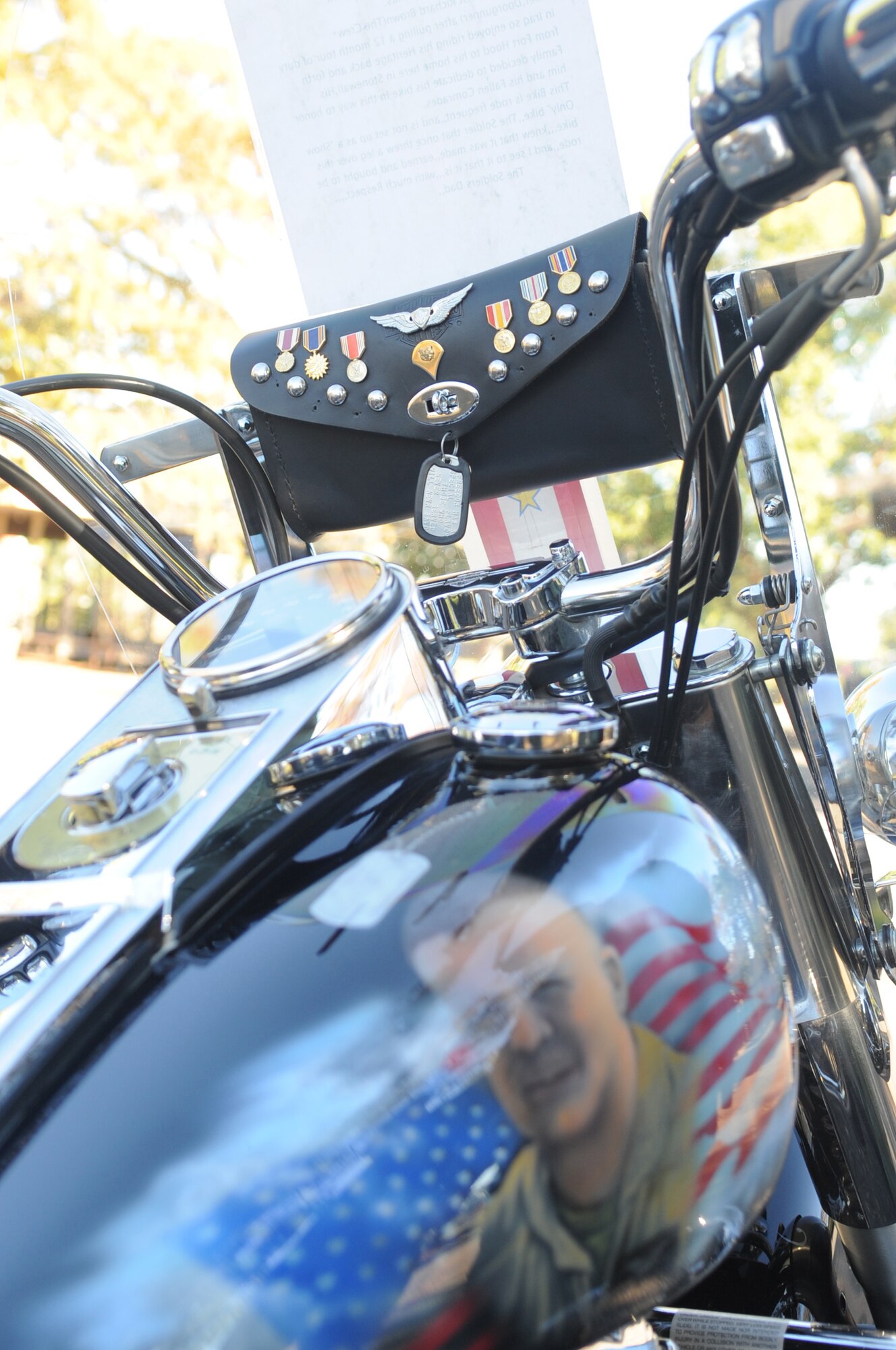A motorcycle driven by Thomas Brown of Stonewall, features the photo and decorations of Spc. Richard Brown, his son and fallen Soldier from the 4th Infantry Division. After the Blackhawk that was carrying him crashed on Nov. 29, 2004, his family decided to dedicate his bike to honor him and his fallen comrades. This bike is ridden frequently and is not set up as a 'show-only' bike. (U.S. Air Force photo/Senior Airman Alexandra M. Boutte) (RELEASED)