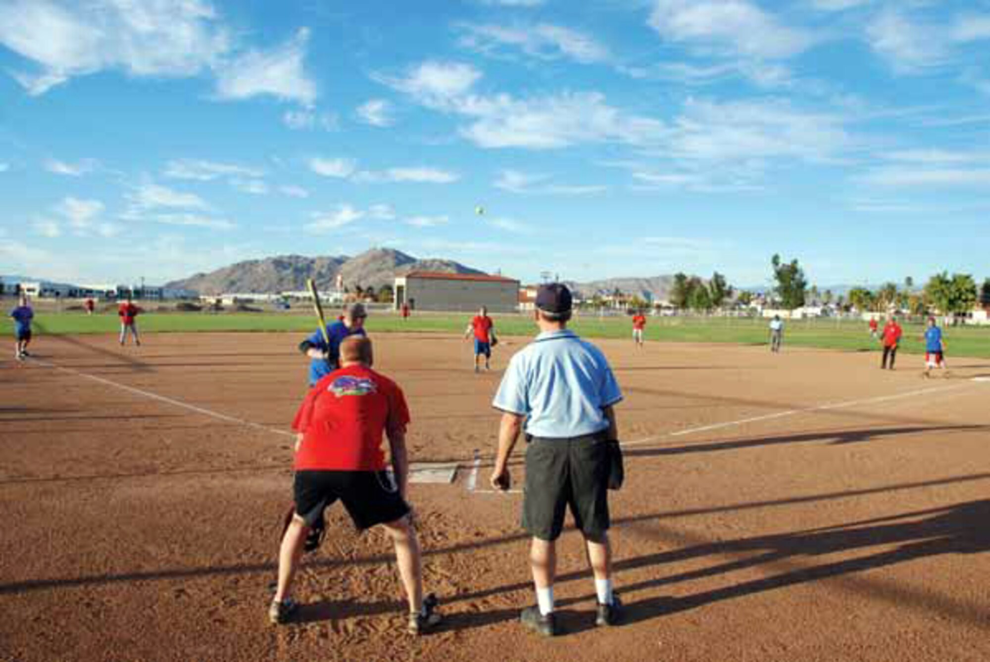 The top players in this year’s intramural softball league play against one another in the All-Star Game Oct. 27. The East team won against the West team with a score of 14-10. The SSI team beat the Security Forces team in both games of the championship held Oct. 19 and Oct. 26 (continuing with extra innings on Oct. 28). The scores of the games were 4-3 and 19-18). Although SSI earned the title of base champions, the Security Forces team was the league champion for the best record during the season. (U.S. Air Force photo by Henry Kim)
