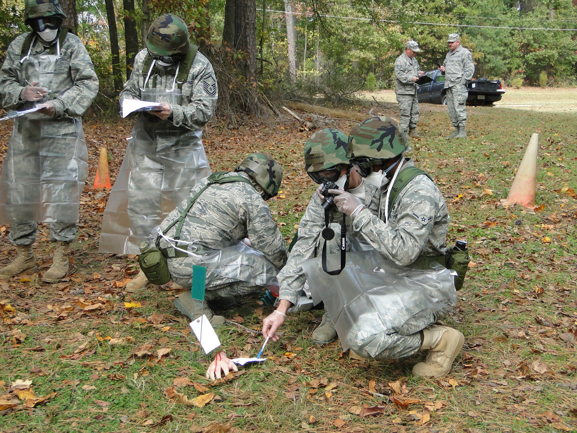 DOBBINS ARB, Ga.-- Members of the 910th Force Support Squadron Readiness team properly tag, plot, photograph and record detailed information concerning search and rescue recovery operations. This event was one of ten events judged during the 2010 AFRC Force Support Readiness Competition held November 1-4, 2010. The 910th Force Support Squadron took first place out of five competing teams. (U.S. Air Force photo /Tech. Sgt. Amber Leone)