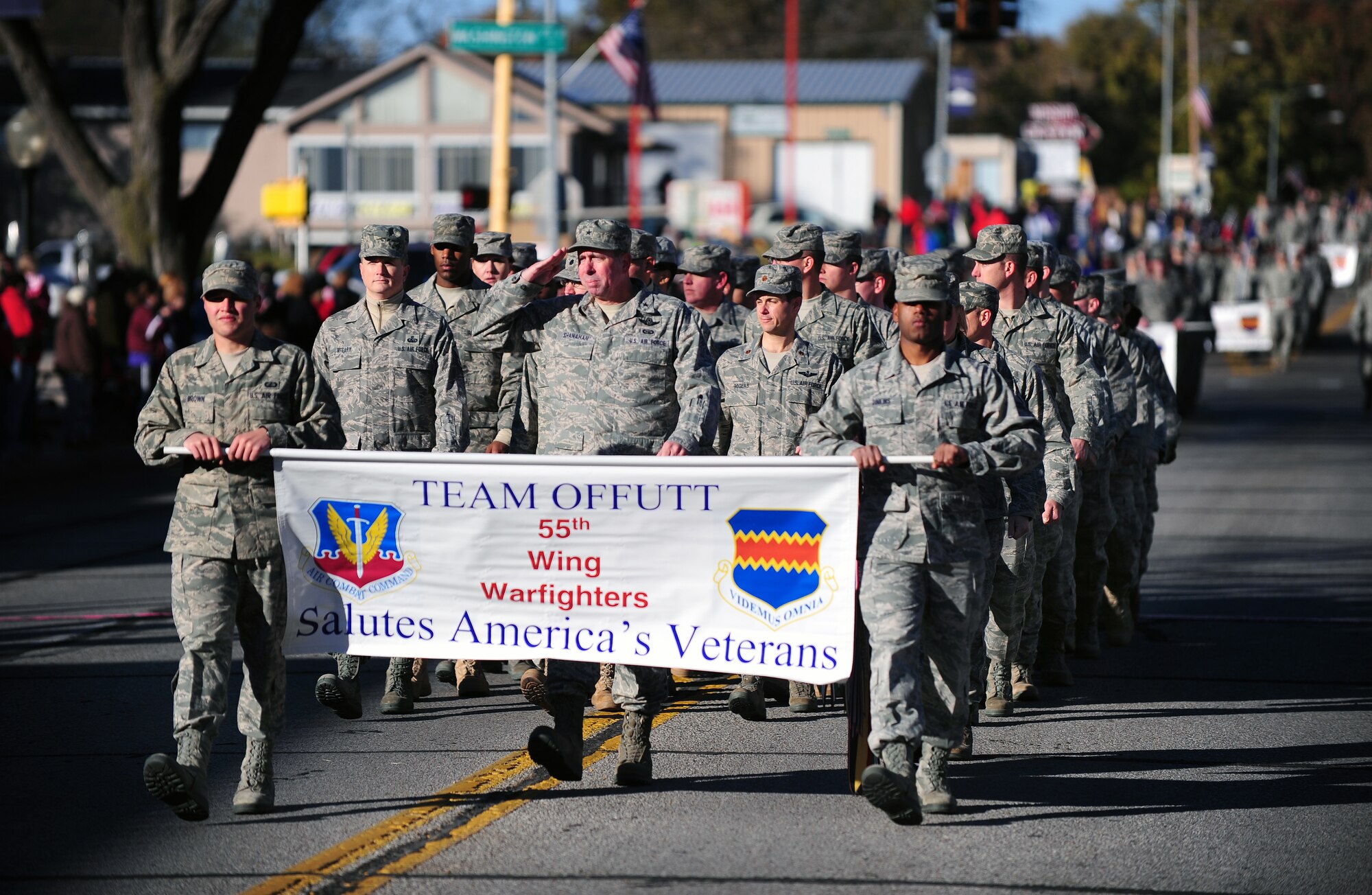 OFFUTT AIR FORCE BASE, Neb. -- Brig. Gen. John N.T. Shanahan, 55th Wing commander, leads members of the Fightin' Fifty-Fifth down Mission Avenue in Old Towne Bellevue, Neb., during Nebraska's Official Veterans Parade Nov. 6.  The annual parade showcased more than 400 Team Offutt troops from the 55th WG, Air Force Weather Agency, U.S. Strategic Command and Heartland of America Band. U.S. Air Force photo by Josh Plueger (Released)
