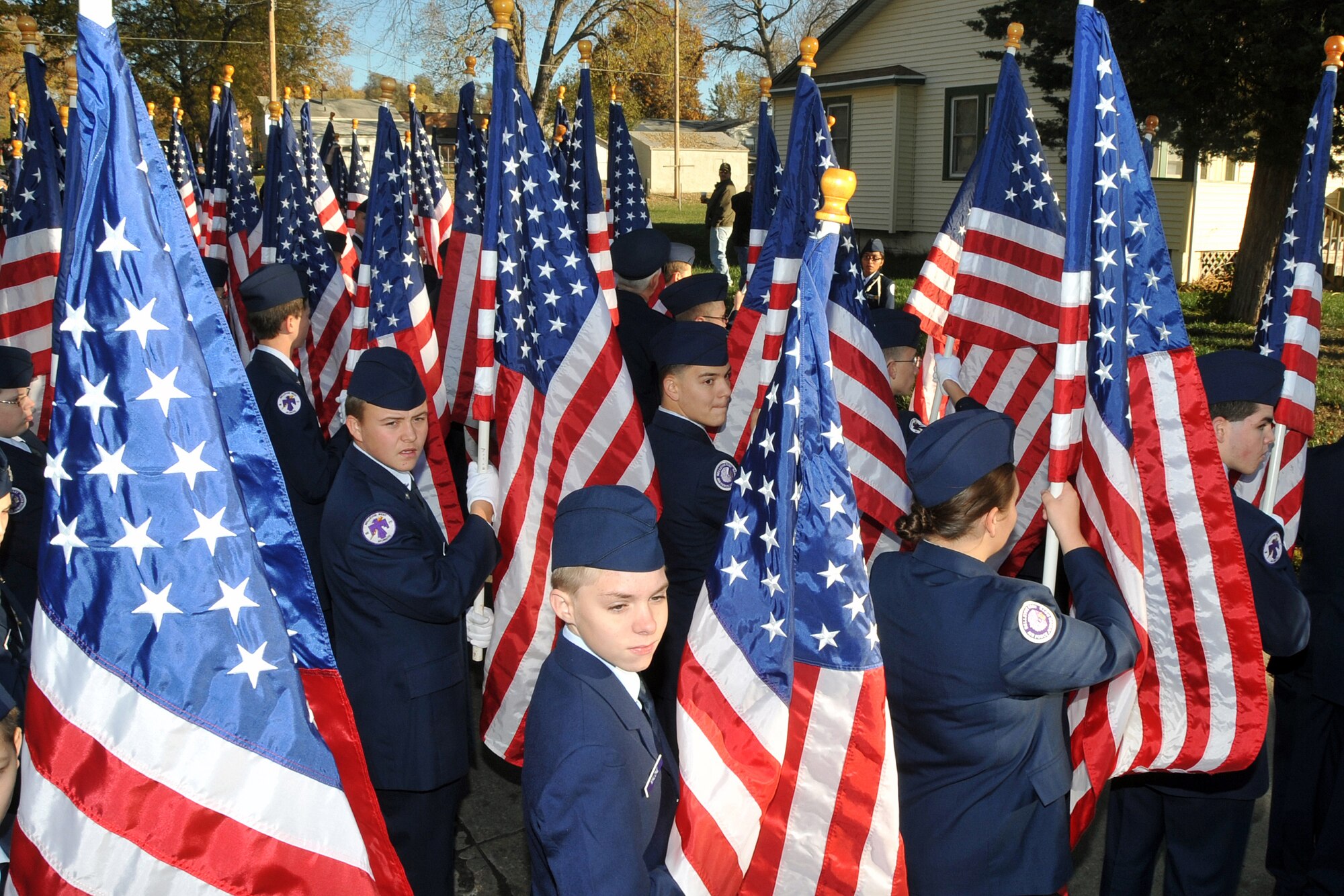 OFFUTT AIR FORCE BASE, Neb. -- Members of the Bellevue East High School Junior ROTC detachment wait for their turn to join Nebraska's Official Veterans Parade Nov. 6 in Olde Towne Bellevue, Neb. Many local residents were on hand to watch the annual parade which honors the service and sacrifices of America's military veterans.  U.S. Air Force photo by Jeff W. Gates.