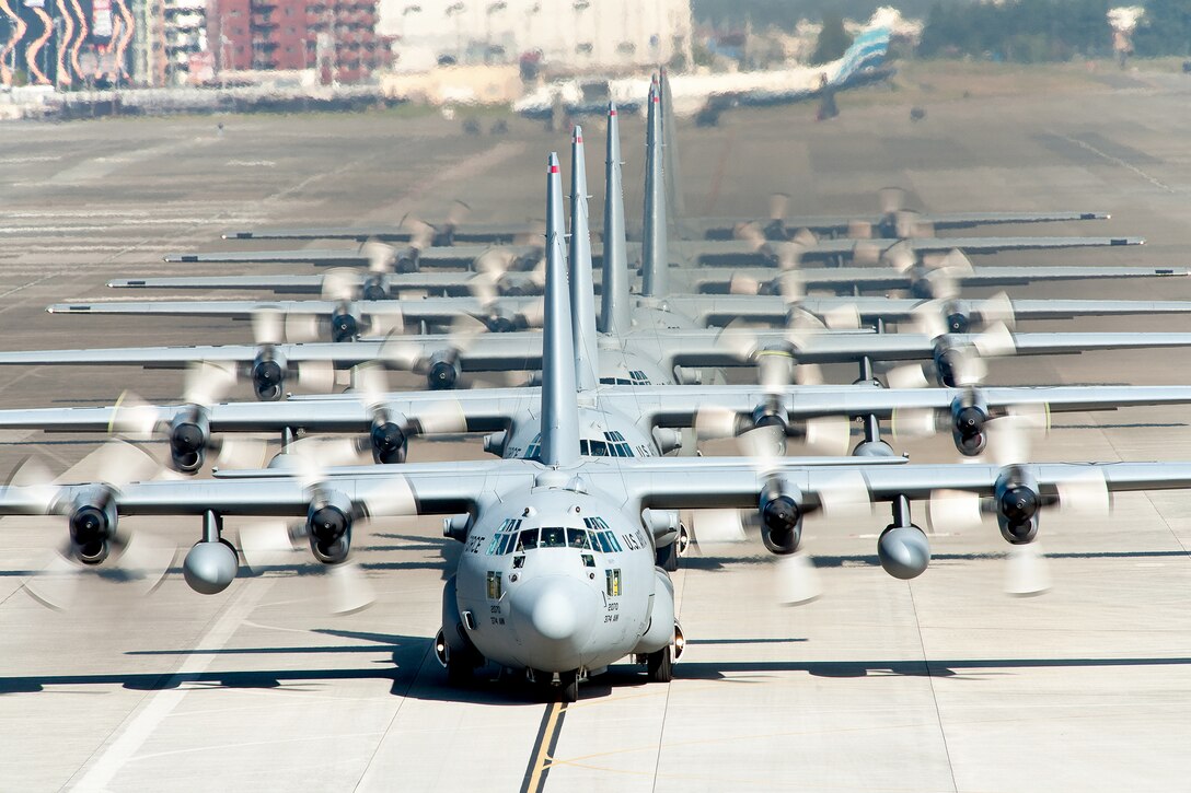 C-130 Hercules aircraft from the 36th Airlift Squadron taxi out for a mission during a seven-ship sortie Nov. 4, 2010, at Yokota Air Base, Japan. The sortie was part of a Samurai Surge exercise. The squadron is the only forward-based tactical airlift squadron in the Pacific region. They provide C-130 aircrews to conduct theater airlift, special operations, aeromedical evacuation, search and rescue, repatriation and humanitarian relief missions. (U.S. Air Force photo/Osakabe Yasuo)