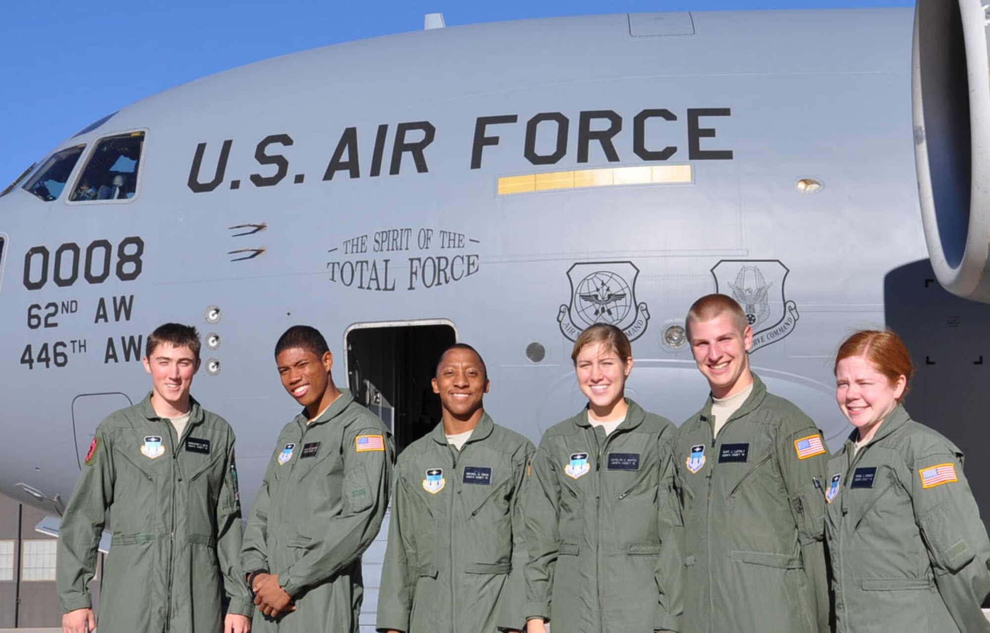 PETERSON AIR FORCE BASE, Colo.- Cadets from the U.S. Air force Academy get ready to take a tour of a C-17 Globemaster III, provded by the aircrew from the 97th Airlift Squadron, Joint Base Lewis-McChord, Wash, Oct. 30. The cadets were taking a tour for an orientation of the C-17 and the airlift mission. (U.S. Air Force photo/Staff Sgt. Javier Cruz)