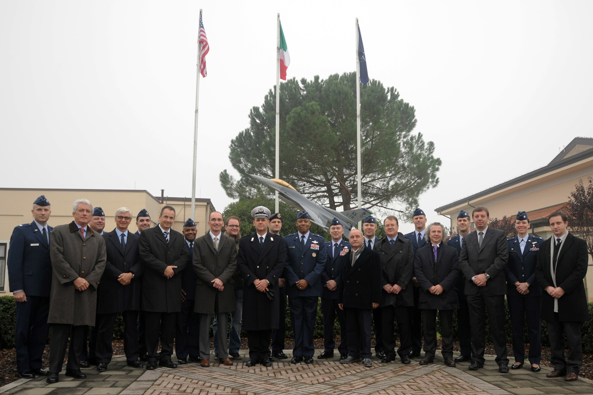 31st Fighter Wing senior leaders take a group photo with 11 Italian community leaders and their respective U.S. Air Force unit commanders Nov. 5, 2010, prior to the 11 Italians being inducted into the 31st FW Honorary Squadron Commander Program at Aviano Air Base, Italy. The HSC program began at Aviano AB in 1997.  (U.S. Air Force photo/Tech. Sgt. Darrell Dean)