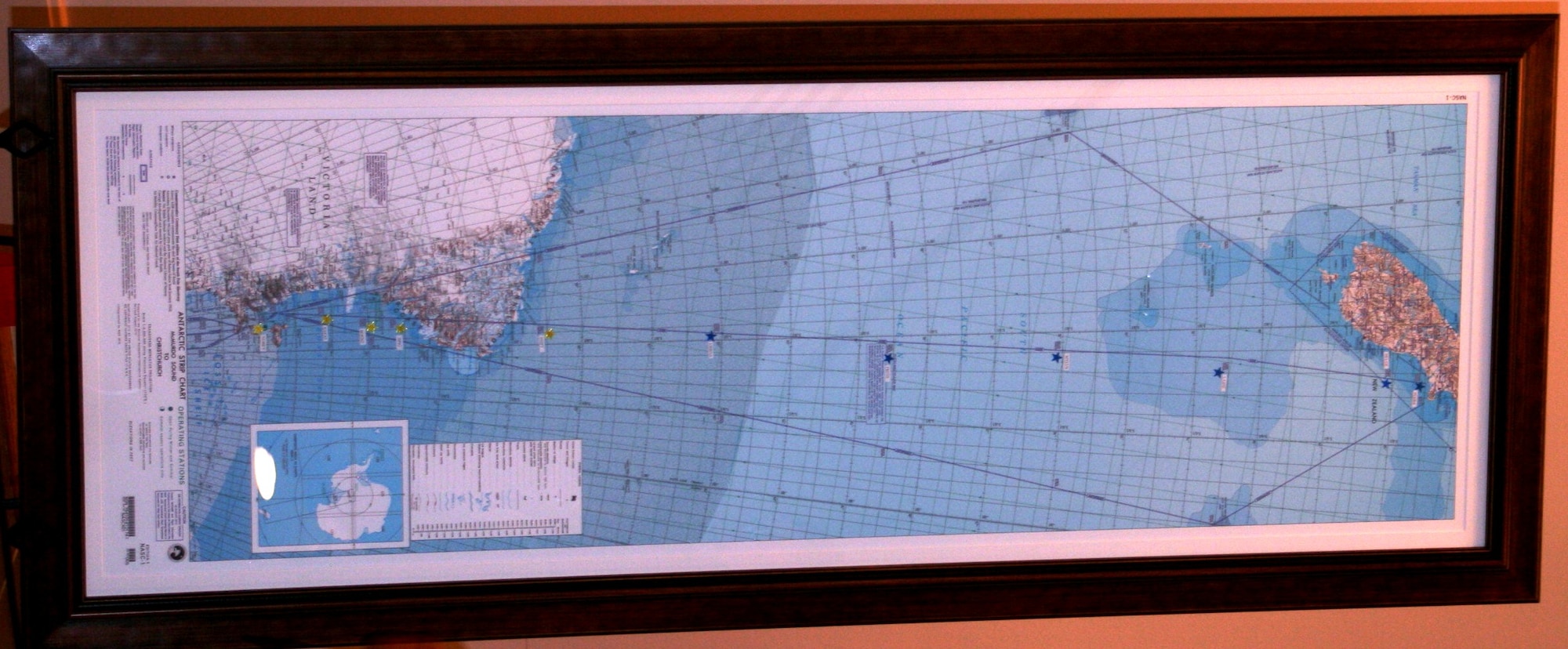 This photo shows a commemorative, centenary, first-edition Antarctic airway chart that was presented to the American Kennel Club Museum of the Dog in Saint Louis, Mo., on Nov. 2, 2010. The chart, created by Col. Ronald Smith who was commander of Operation Deep Freeze from 2005 to 2008, shows “Airway 338” waypoints with each waypoint named after sled dog teams of Norwegian explorer Roald Amundsen and the pony pack team of British explorer Capt. Robert Falcon Scott. The aeronautical chart is used in international flight navigation from New Zealand to Antarctica -- especially for Operation Deep Freeze. Colonel Smith is the Air National Guard advisor to Maj. Gen. Susan Desjardins, Air Mobility Command’s Director of Strategic Plans, Requirements and Programs at Scott Air Force Base, Ill. (U.S. Air Force Photo/Master Sgt. Scott T. Sturkol)