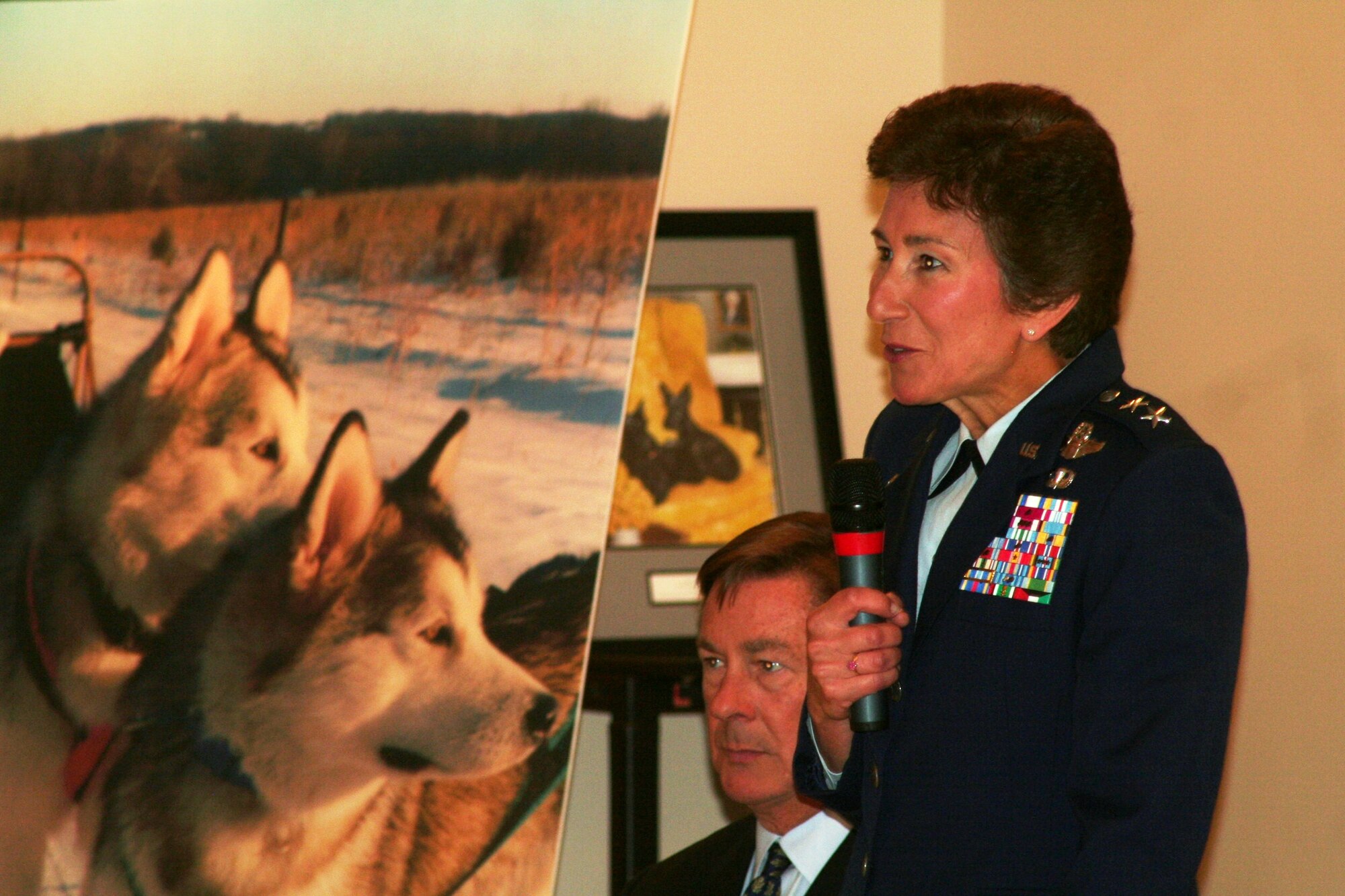Maj. Gen. Susan Desjardins, Air Mobility Command's Director of Strategic Plans, Requirements and Programs at Scott Air Force Base, Ill., provides remarks during the presentation of a commemorative, centenary, first-edition Antarctic airway chart to the American Kennel Club Museum of the Dog in Saint Louis, Mo., on Nov. 2, 2010. The chart, created by Col. Ronald Smith who was commander of Operation Deep Freeze from 2005 to 2008, shows “Airway 338” waypoints with each waypoint named after sled dog teams of Norwegian explorer Roald Amundsen and the pony pack team of British explorer Capt. Robert Falcon Scott. The aeronautical chart is used in international flight navigation from New Zealand to Antarctica -- especially for Operation Deep Freeze. Colonel Smith is General Desjardins' Air National Guard advisor. (U.S. Air Force Photo/Master Sgt. Scott T. Sturkol)