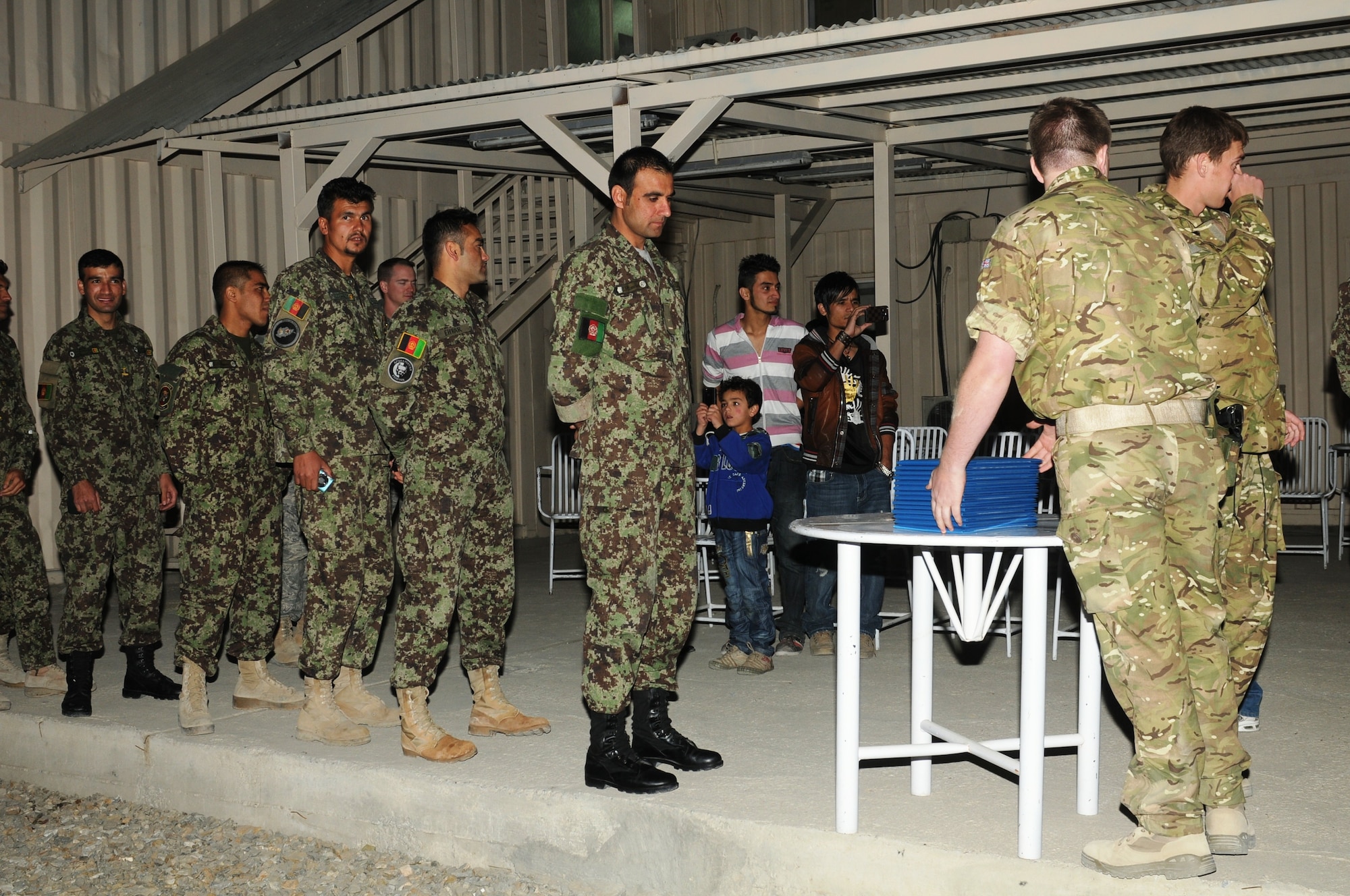KABUL, Afghanistan - Afghan Air Force’s Thunder Lab celebrates the graduation of 14 pilot candidates who will now proceed to more advanced training in the U.S. (U.S. Air Force photo by Capt. Rob Leese/ RELEASED).