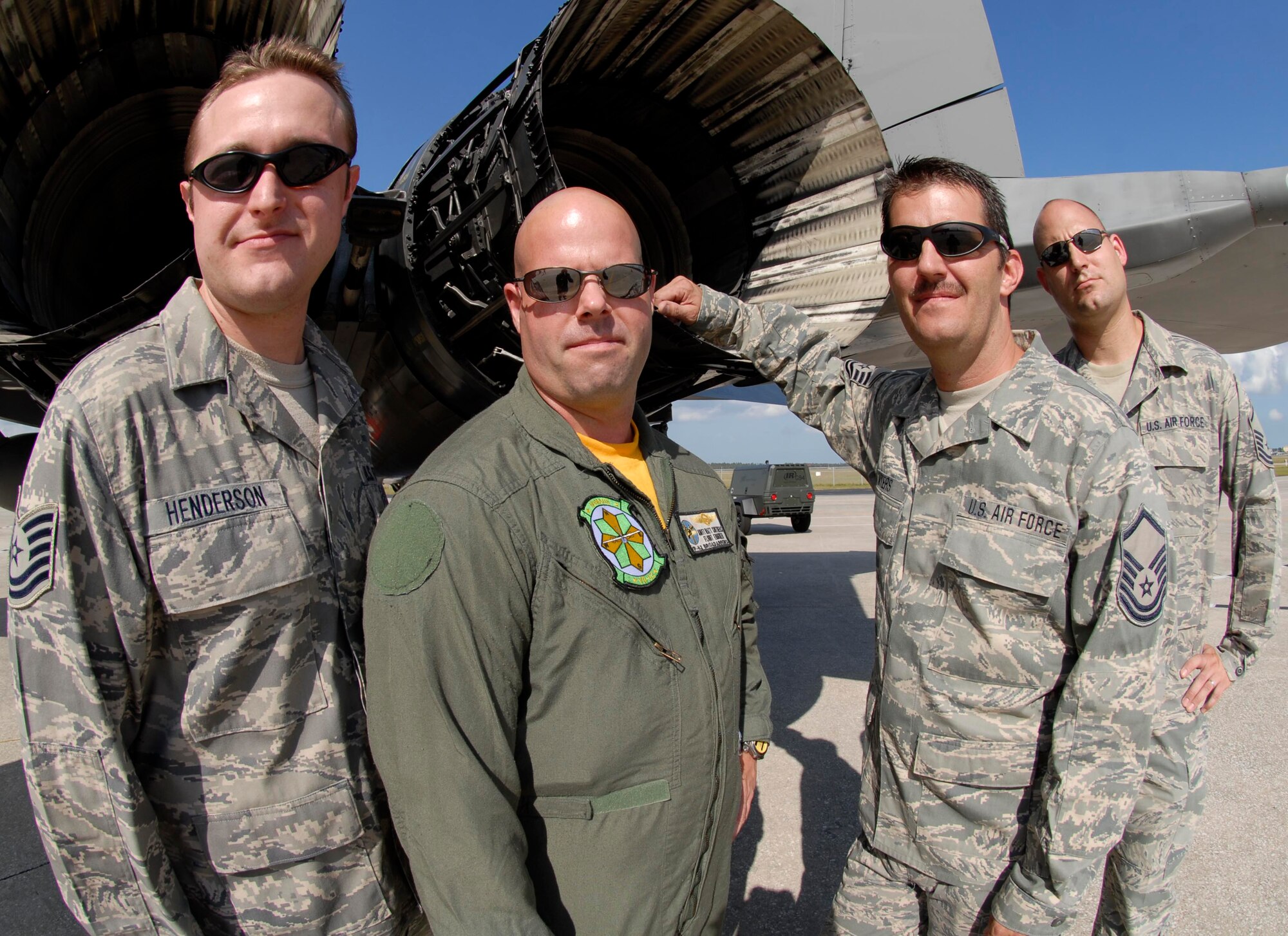 American Attitude: Tech. Sgt. Chris Henderson (left), Petty Officer 1st Class Matt Smithers, Master Sgt. Marc Myers and Master Sgt. Shawn Watchhorn. Photo by Master Sgt. Thomas Kielbasa