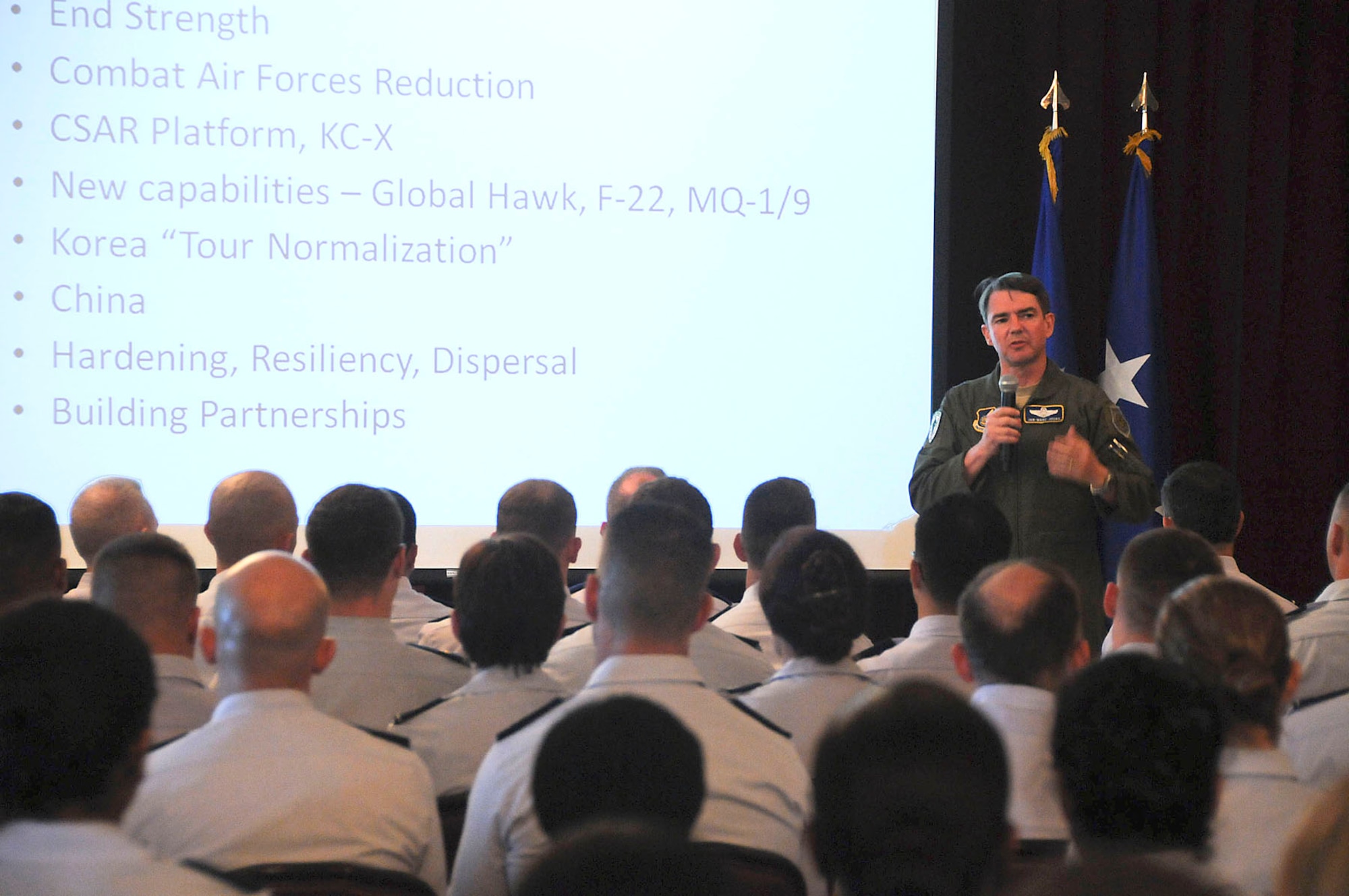 Maj. Gen. Jan-Marc Jouas, the Director of Operations, Plans, Requirements and Programs, Headquarters Pacific Air Forces, speaks to Kadena officers during an officers-call Nov. 8. The general, who led Kadena as the 18th Wing commander from 2004-2006, spent the previous weekend at Kadena to take part in the 11th Annual Kadena Special Olympics and then spoke to officers from thoughout the base. (U.S. Air Force photo / Staff Sgt. Darnell Cannady)