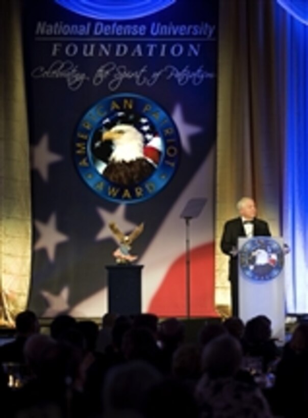 Secretary of Defense Robert M. Gates gives his remarks after being awarded the 2010 American Patriot Award for outstanding contributions to the intelligence, national security and defense communities by the National Defense University Foundation at the Ronald Reagan Building in Washington, D.C., on Nov. 5, 2010.  In accepting the prestigious award Gates said he was doing so on behalf of all the young men and women in uniform who serve their country in time of war.  