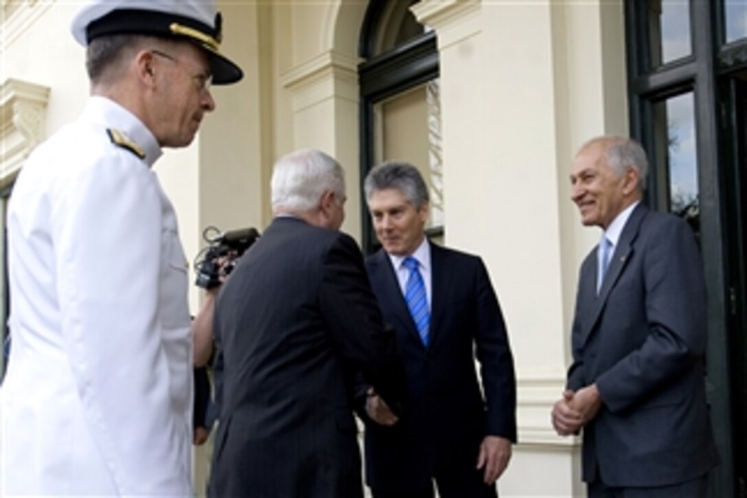 Secretary of Defense Robert M. Gates and Chairman of the Joint Chiefs of Staff Adm. Mike Mullen are greeted by Australian Defense Minister Stephen Smith and the Governor of Victoria Professor David de Kretser at Government House in Melbourne, Australia, on Nov. 8, 2010.  