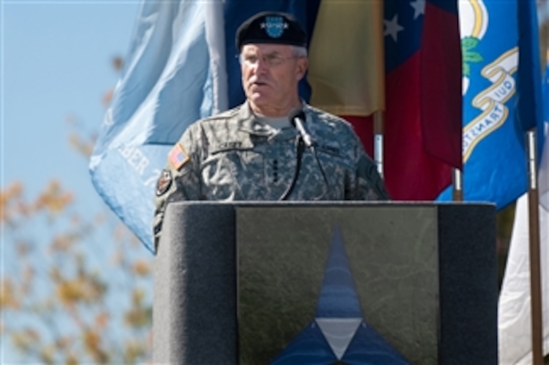 Chief of Staff of the Army Gen. George W. Casey Jr. delivers his address to the audience at a remembrance ceremony at Fort Hood, Texas, on Nov. 5, 2010.  The ceremony commemorated the lives lost by 13 people in a tragic shooting incident on the installation on Nov. 5, 2009.  