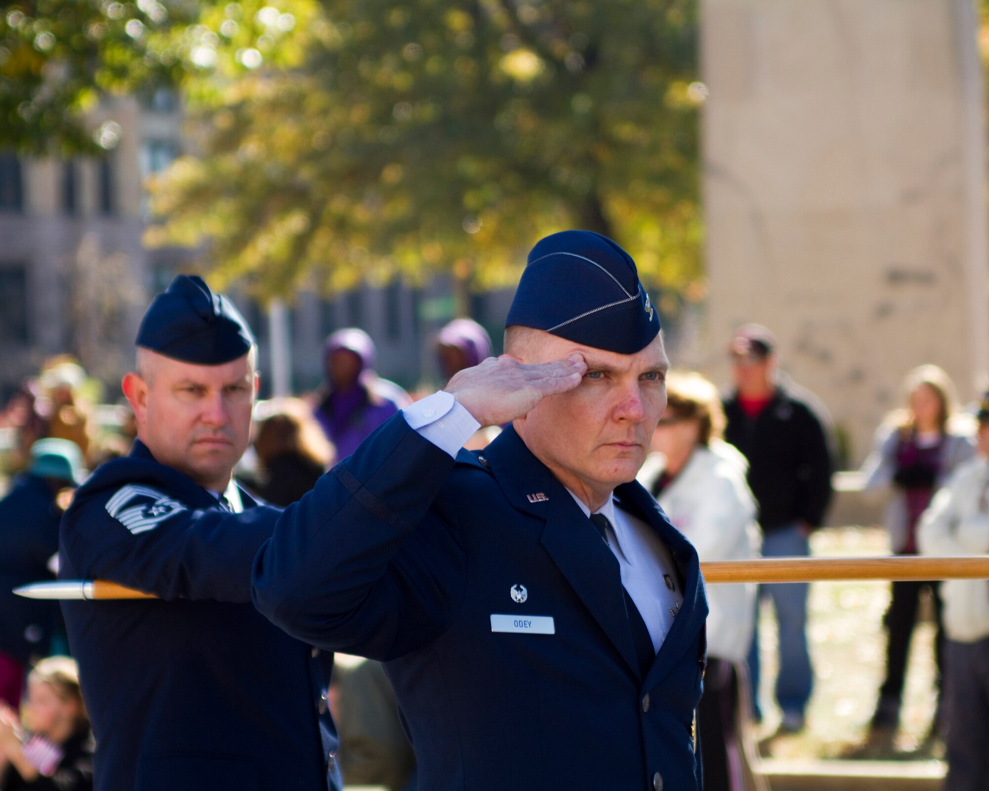 Col. John Odey, AFNIC commander, and Chief Master Sgt. Paul Taitt, superintendent, salute local dignitaries during a Veterans Day parade in downtown St. Louis Nov. 6. (U.S. Air Force photo/MSgt G. Shawn Lowry)
