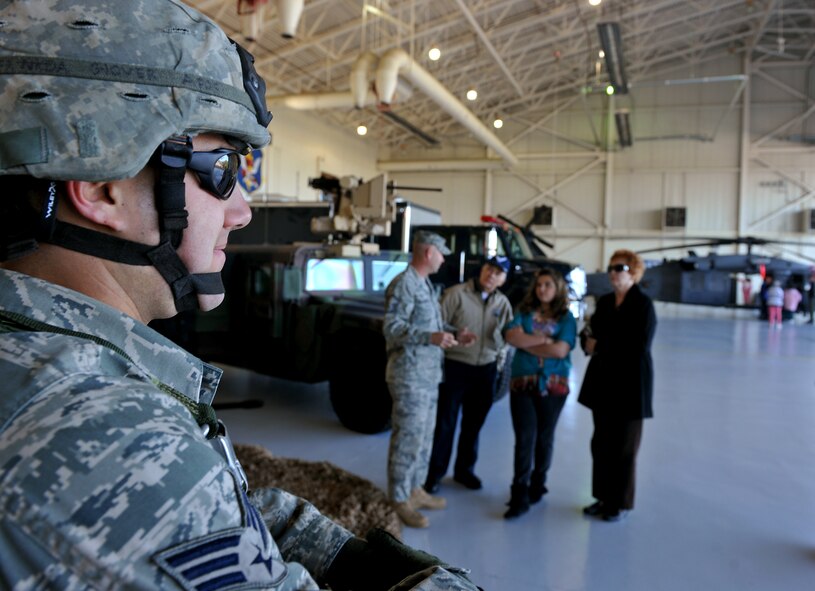 MOODY AIR FORCE BASE, Ga. -- Senior Airman Brent Glover, 822nd Base Defense Squadron fire team leader, participated in Retiree Appreciation Day by fielding questions pertaining to his career field here Nov. 6. During the week, Moody hosted several events culminating on Nov. 6 with a Tricare health briefing, flu shots, ID card renewals and static displays. (U.S. Air Force photo/Airman 1st Class Joshua Green)(RELEASED)
