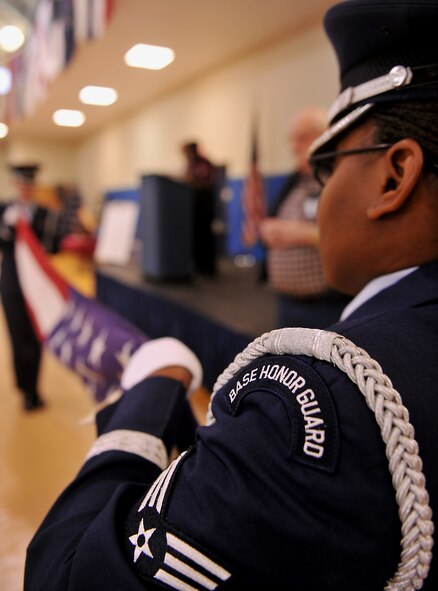 MOODY AIR FORCE BASE, Ga. -- Airmen from the Moody AFB Honor Guard presents the American flag during a flag-folding ceremony during Retiree Appreciation Day here Nov. 6. After the flag was folded, the Honor Guard presented the flag to Will Allen, retired Army veteran enlisted in 1970 in the supply munitions career field. (U.S. Air Force photo/Airman 1st Class Joshua Green)(RELEASED)
