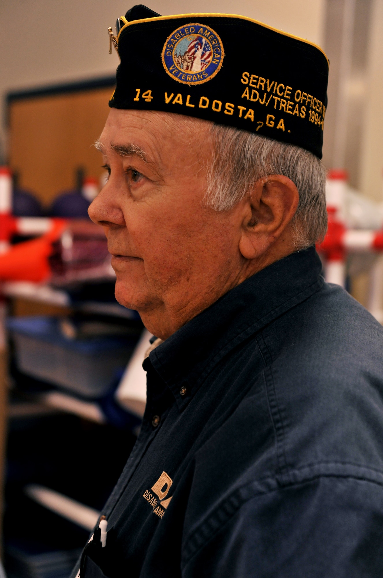 MOODY AIR FORCE BASE, Ga. -- Howard Bell, Disabled American Veterans chapter services officer, waits in line for refreshments during Retiree Appreciation Day here Nov. 6. Mr. Bell dedicates his time to retired individuals from the military to help them make the transition from military to civilian life by use of non-profit services. (U.S. Air Force photo/Airman 1st Class Joshua Green)(RELEASED)
