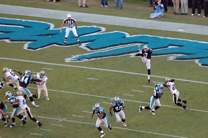 Carolina Panthers kicker Jason Baker punts the ball during the Carolina Panthers and New Orleans Saints football game Nov. 7, 2010, in Charlotte, N.C. The Carolina Panthers hosted color guard members from all branches of the military in recognition of Veterans Day. The Panthers lost to the Saints 34-3. (U.S. Air Force photo/Staff Sgt. Marie Brown)