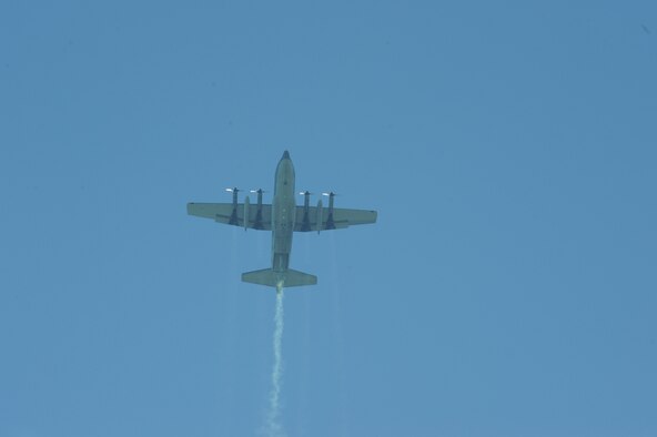 FT. PIERCE, Fla. - An  HC-130P/N King from the 920th Rescue Wing, Patrick Air Force Base, Fla., flies over the National Navy UDT-SEAL Museum here, Nov. 6, 2010, for the museum's 25th annual muster. The plane dropped off the Navy's official parachute team, the Leap Frogs, as part of a demonstration for a crowd of approximately 5,000 service members and civilians (Photo/Senior Airman Anna-Marie Wyant).