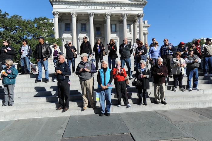 Members of the crowd watch as veterans march by during the Veterans Day parade sponsored by the Ralph H. Johnson Veterans Affairs Medical Center Nov. 7, 2010, in downtown Charleston, S.C. (U.S. Air Force photo/James M. Bowman)(released)