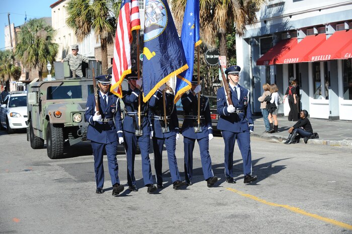 Members of the Joint Base Charleston Honor Guard march in the Veterans Day parade Nov. 7, 2010, in downtown Charleston, S.C. The parade was sponsored by the Ralph H. Johnson Veterans Affairs Medical Center. Retirees, active-duty members and former prisoners of war from all branches of the armed forces joined together to celebrate. (U.S. Air Force photo/James M. Bowman)(released)