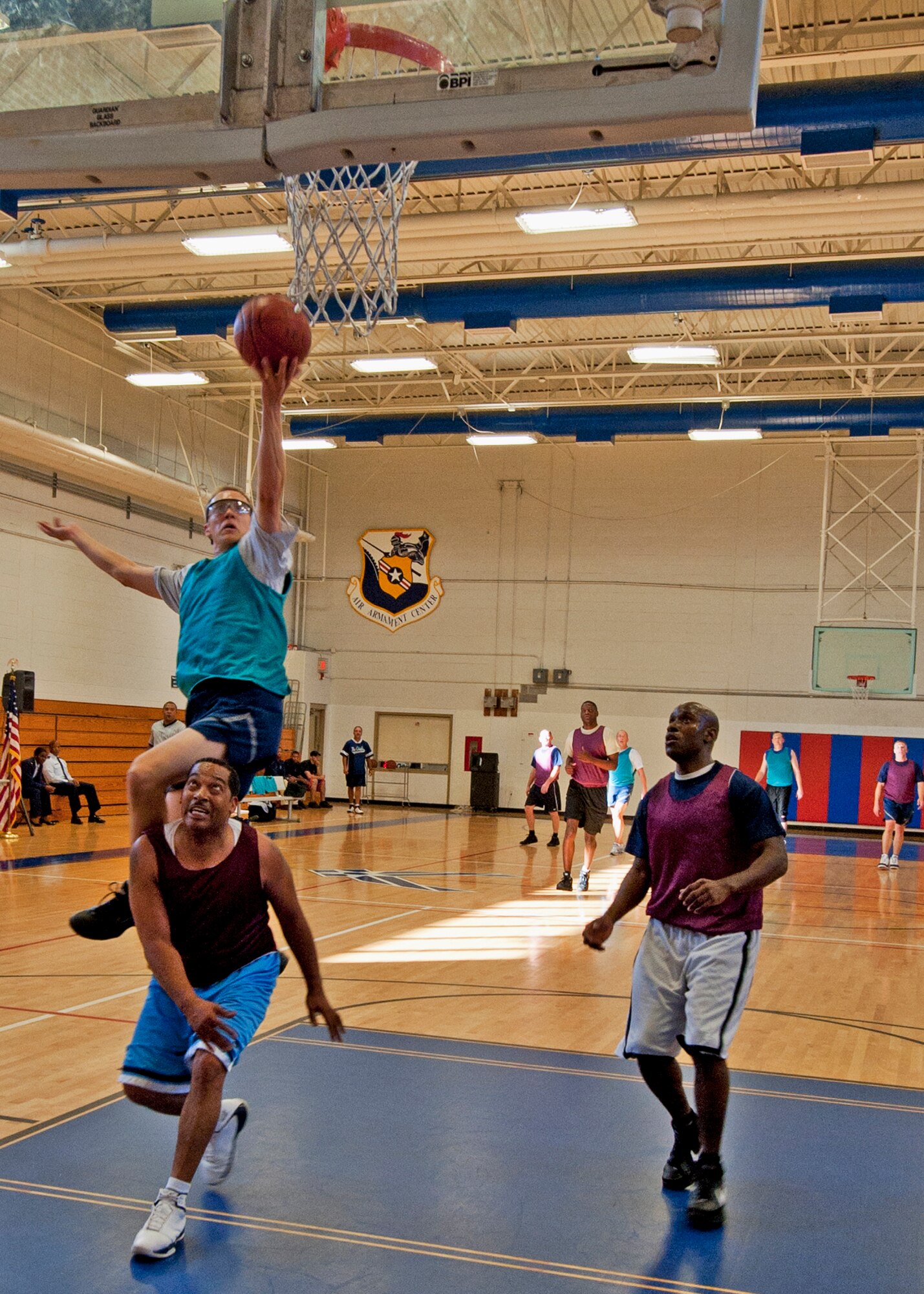 Dave Meissen, 96th Civil Engineer Squadron, drives to the basket for two of his 15 points in the Commanders’ runaway victory over the Shirts Nov. 8.  The game began Eglin’s first-ever commanders versus shirts sports competition.  Meissen and Tim Welde “commanded” the game to an easy 44-25 victory.  (U.S. Air Force photo/ Samuel King Jr.)