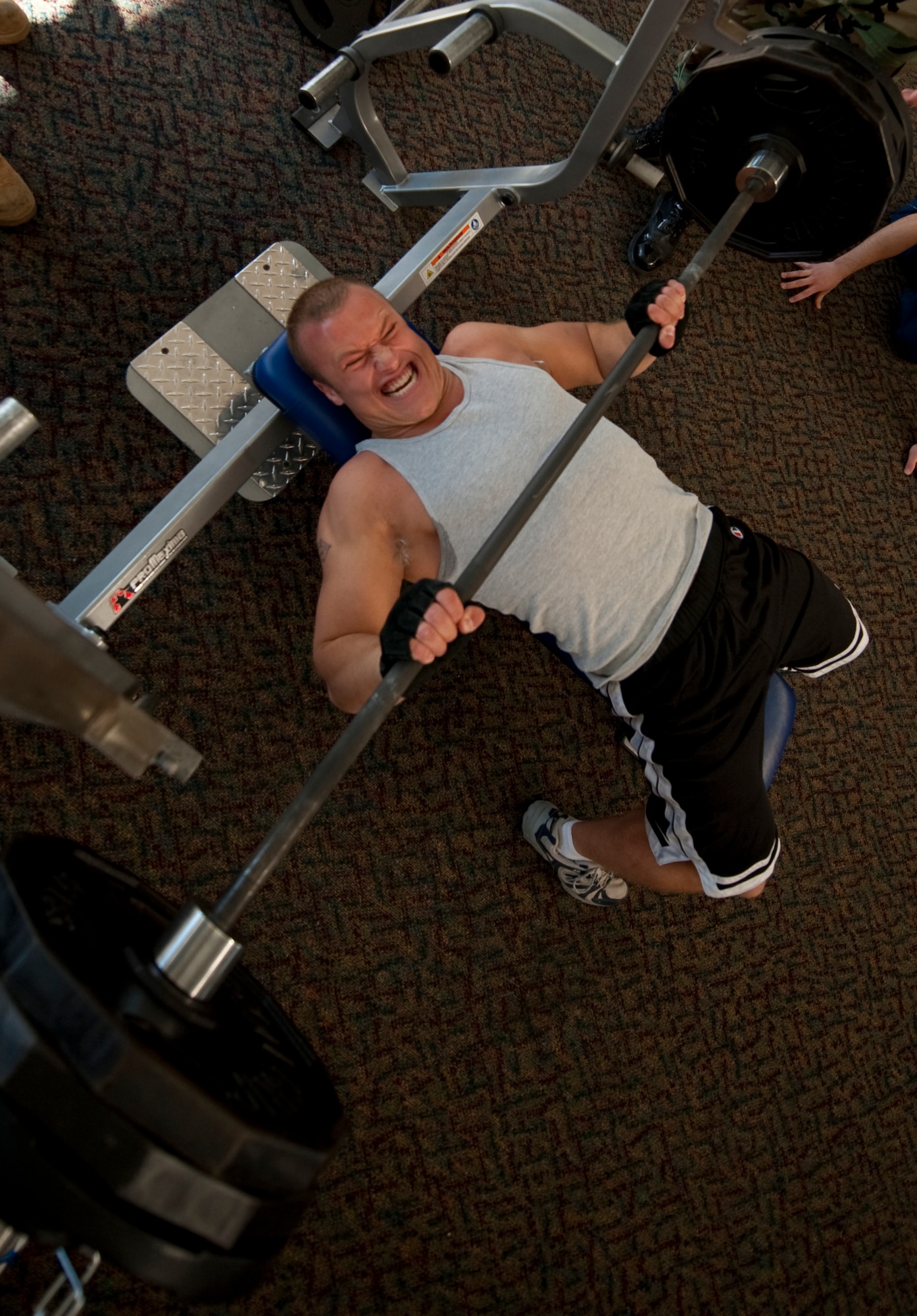 HOLLOMAN AIR FORCE BASE, N.M. -- Airman 1st Class Paul Heileman performs a bench press during the Powerlifting Competition at the Domenici Fitness and Sports Center Nov. 5, 2010. The event, organized by the 49th Maintenance Squadron, gave Holloman members an opportunity to test their strength and compete against each other in the squat, bench press and dead-lift. Airman Heileman is with the 49th Logistic Readiness Squadron. (U.S. Air Force photo by Airman 1st Class Joshua Turner/Released)