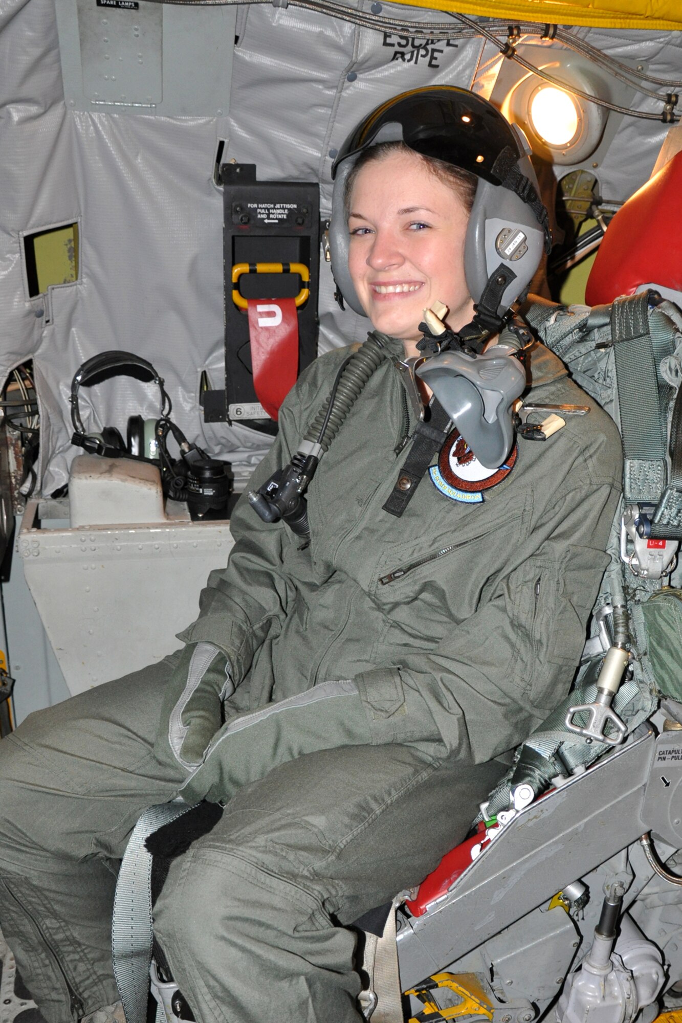 Senior Airman Brooke Simon, 717th Aircraft Maintenance Squadron, strikes a very happy, once in a lifetime pose aboard a B-52 Stratofortress from the 917th Wing at Barksdale Air Force Base, La., after completing an incentive ride Nov. 5, 2010. Airman Simon was allowed to tag along on a training mission with a 93rd Bomb Squadron crew as a part of the 917th Wing Commander’s program of incentive flights for top performers. Airman Simon was named the 917h Wing’s Airman of the Quarter for the second quarter of 2010. (U.S. Air Force photo/Tech. Sgt. Jeff Walston)

