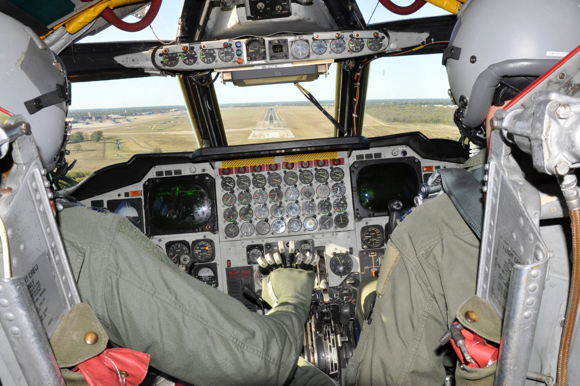 Lt. Col. Robert Vanhoy, command pilot, 93rd Bomb Squadron, and Capt. Dane Collette, co-pilot, 11th Bomb Squadron, line up with the runway for landing after successfully completing several simulated bombing runs on their targets in a B-52 Stratofortress during a training sortie in the skies over Northern, La., Nov. 5, 2010. The crew of the B-52 also carried with them two happy participants in the incentive ride program instituted by the 917th Wing commander to reward top performers in the unit. (U.S. Air Force photo/Tech. Sgt. Jeff Walston)