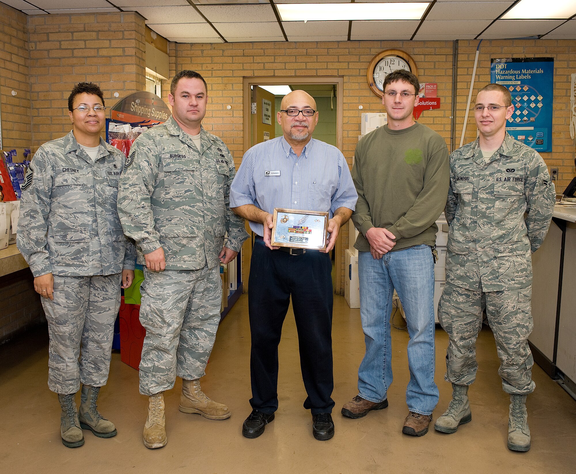 2 Nov 2010  USAF Photo by Jason Minto.  
Fernando Martin, USPS worker and the holder of two purple hearts receives a new ribbon case.