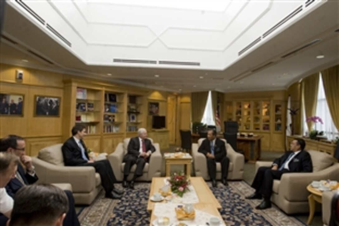 U.S. Defense Secretary Robert M. Gates, left center, meets with Malaysian Deputy Prime Minister Tan Sri Muhyidden Yassin in Kuala Lumpur, Malaysia, Nov. 9, 2010.  