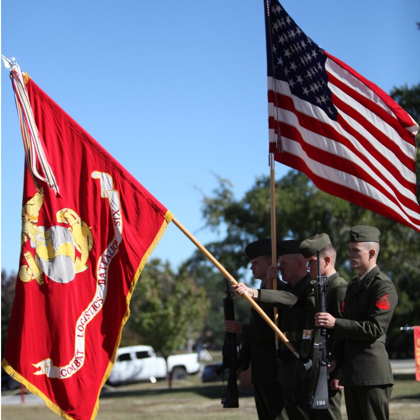 The color guard for Combat Logistics Battalion 6, 2nd Marine Logistics Group, present the colors while the national anthem plays during a ceremony aboard Camp Lejeune, N.C., Nov. 10, 2010. The ceremony celebrated the Marine Corps’ 235th birthday.  (U.S. Marine Corps photo by Pfc. Franklin E. Mercado)