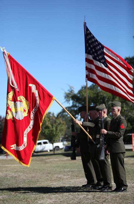 The color guard for Combat Logistics Battalion 6, 2nd Marine Logistics Group, present the colors while the national anthem plays during a ceremony aboard Camp Lejeune, N.C., Nov. 10, 2010. The ceremony celebrated the Marine Corps’ 235th birthday.  (U.S. Marine Corps photo by Pfc. Franklin E. Mercado)