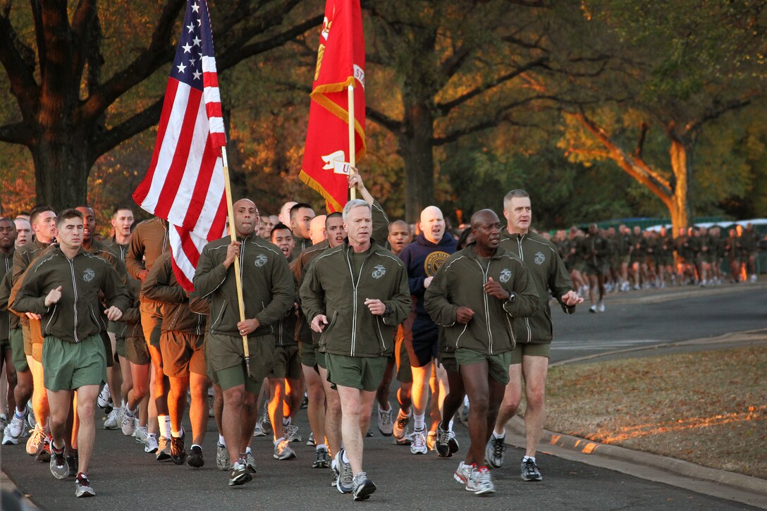 Gen. James F. Amos, commandant of the Marine Corps and Sgt. Maj. Carlton W. Kent, sergeant major of the Marine Corps lead a formation run of more than 400 Marines on the Marine Corps' 235th birthday Nov. 10, 2010. Amos spoke to the Marines at the Marine Corps War Memorial and said no matter the clime or place Marines have always found time to celebrate their birthday.