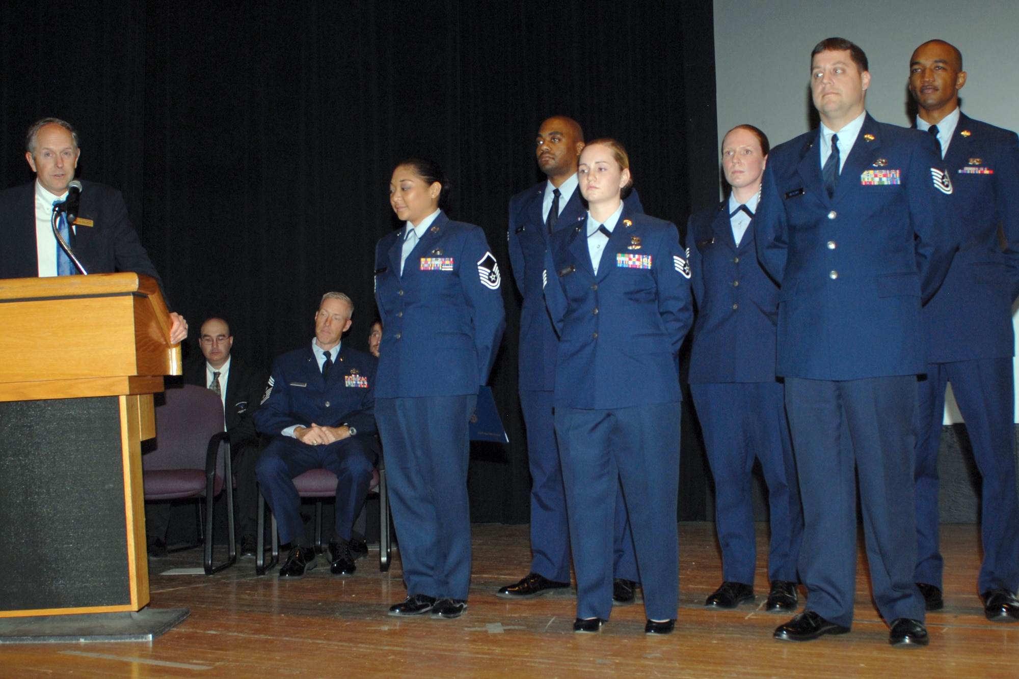 Dr. Eric Ash, Wayland Baptist University executive director – Anchorage Campus, addresses graduates of the Community College of the Air Force at the Elmendorf Theater, Nov. 5. More than 200 Airmen completed Community College of the Air Force degrees, marked by the ceremony. (U.S. Air Force photo/Steven White)