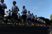 JOINT BASE PEARL HARBOR-HICKAM, Hawaii – Members of Joint Base Pearl Harbor-Hickam run in formation during the Warrior Run here, Nov. 5. This month, the Warrior Run  was hosted by Colonel Robert Dague, 15th Wing vice commander. (U.S. Air Force photo/Senior Airman Gustavo Gonzalez)